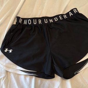 Women’s Under Armour loose fit shorts with pockets, size small, black and white.